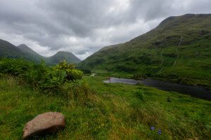 Beinn Maol Chaluim, Stob Na Doire, Stob Dearg (Buachaille Etive Mòr), the River Etive, and Beinn Ceitlein with its waterfalls formed by the heavy rain.